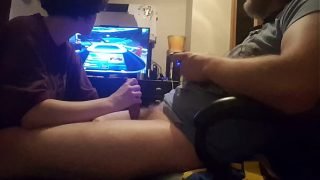 Big hard cock sucked while playing video game